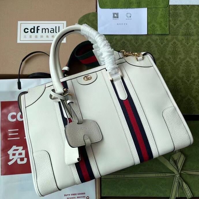 G*u*i top handle bags